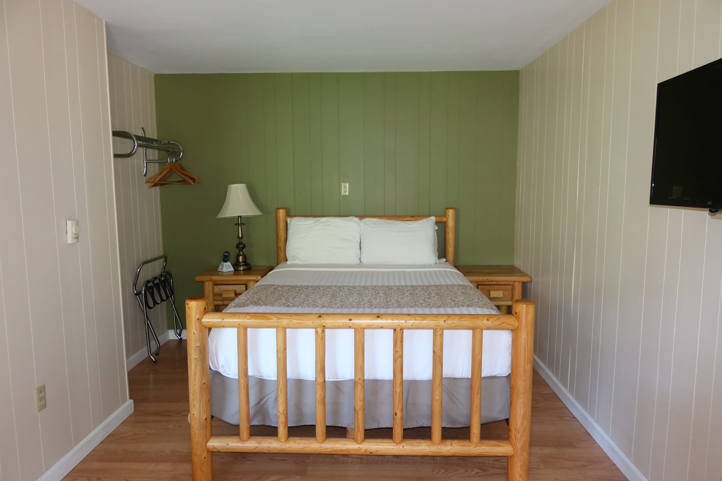 Room #26 interior with 1 queen bed