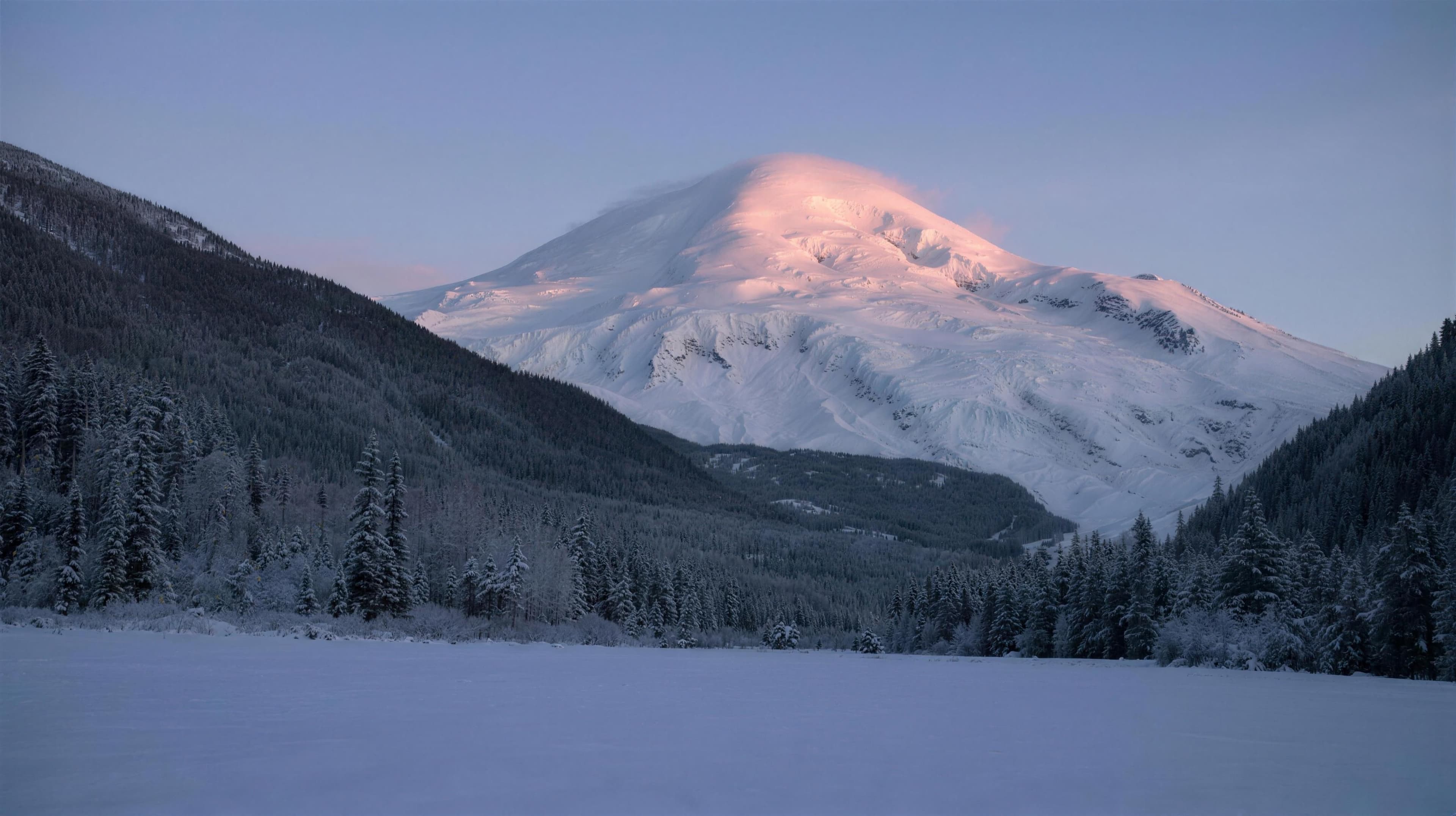 The same valley under deep winter snow